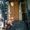 Boarded up home in the Bronx that has been foreclosed.